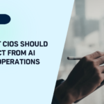 CIO reviewing AI-driven IT operations lifecycle data on a tablet.